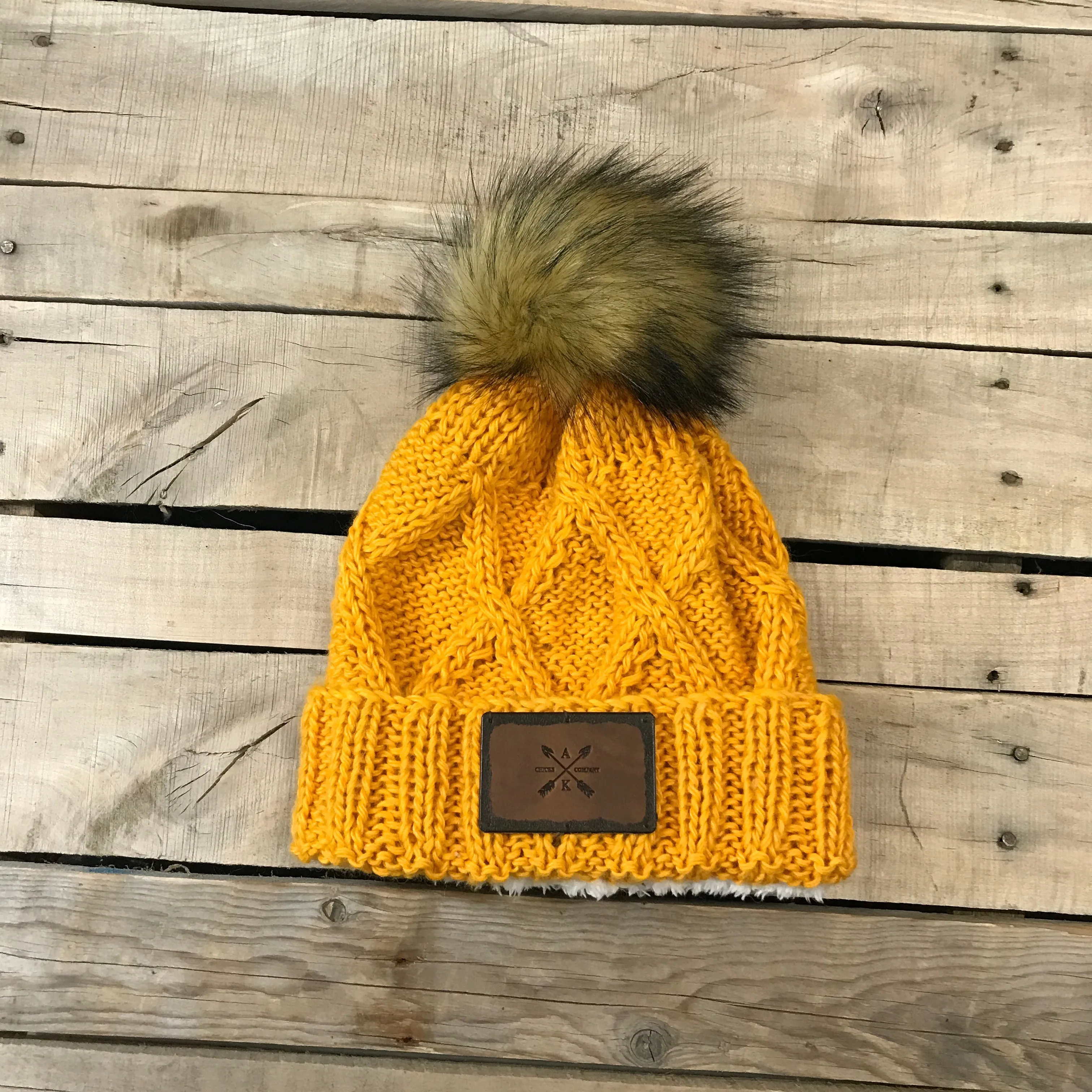 Cross Knit Faux Puff Hat